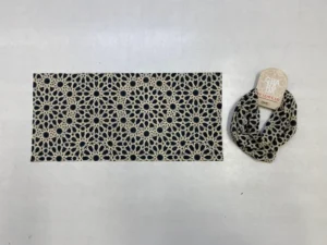Black and beige Islamic geometric buff laid flat and packaged
