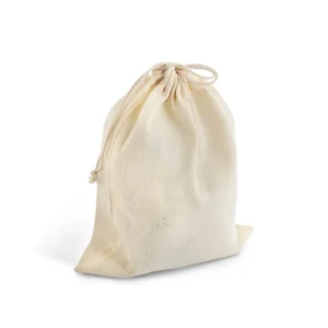 Natural cotton drawstring pouch filled and tied closed, standing upright on white background